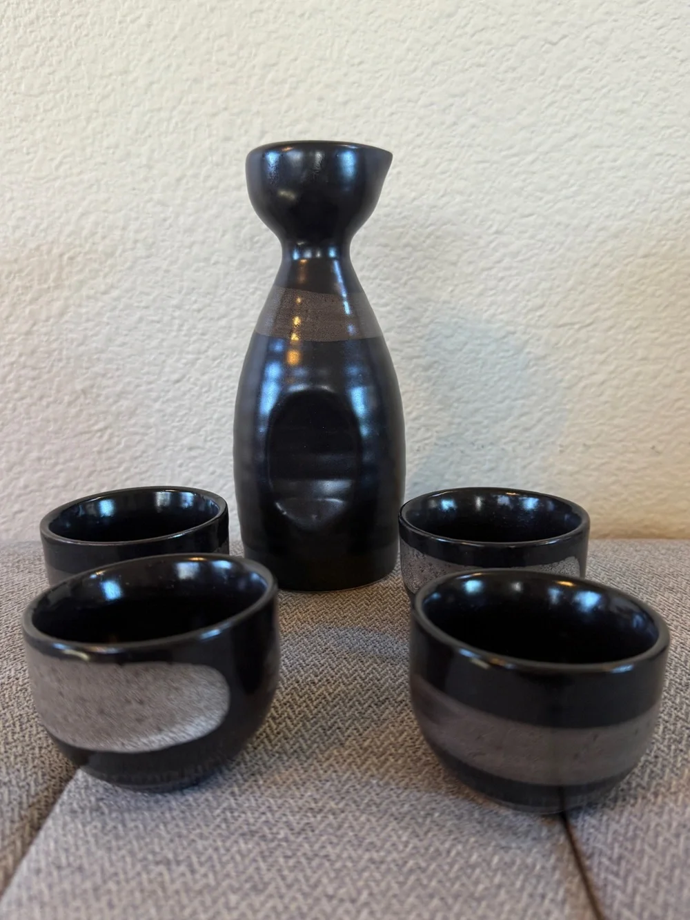 Japanese Sake Set with Tokkuri and Four Sakaguki Cups - Black and Brown